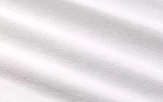 Nonwoven cleanroom wipers including cellulose polyester and polypropylene options